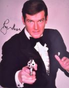 ROGER MOORE - JAMES BOND 007 - SIGNED 14X11" PHOTOGRAPH