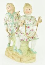 GEBRUDER HEUBACH - BISQUE CERAMIC FIGURE OF CHILDREN