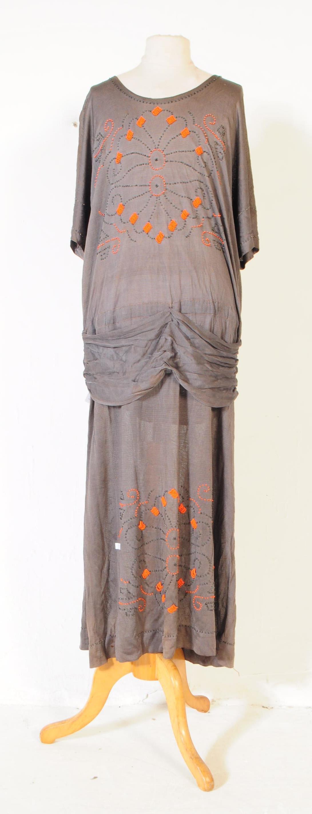 1920S ERA CANADIAN GREY AND ORANGE BEADED DRESS