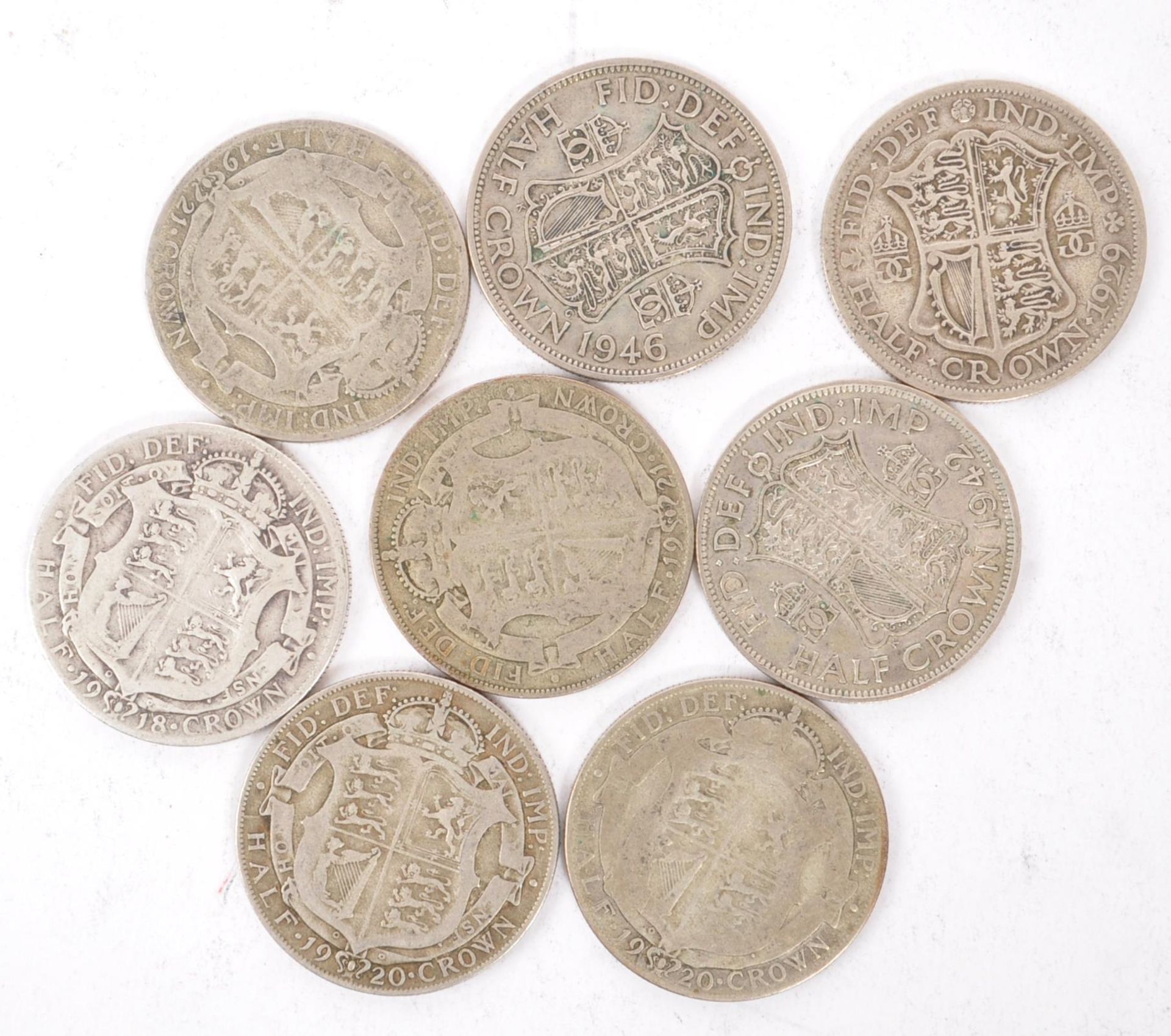 EIGHT EARLY 20TH CENTURY SILVER HALF CROWNS