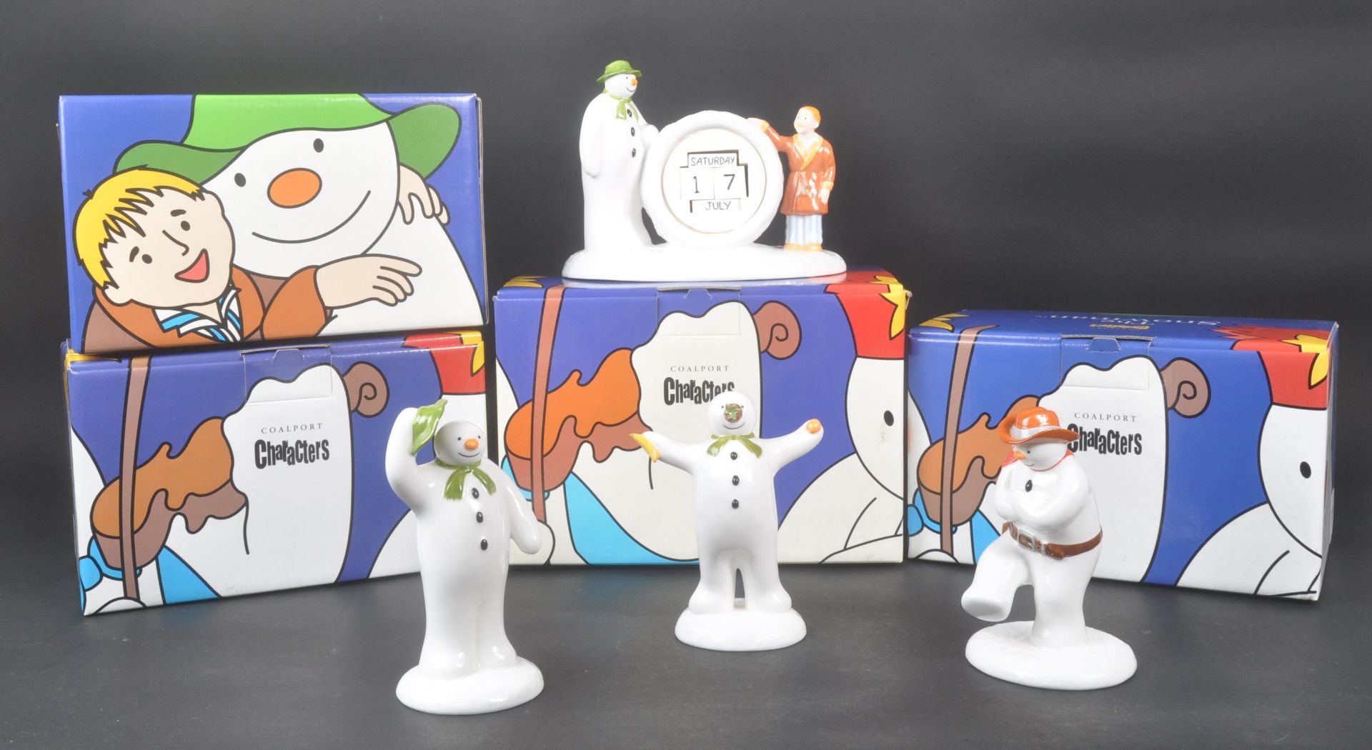 COALPORT CHARACTERS - THE SNOWMAN - FOUR PORCELAIN FIGURES