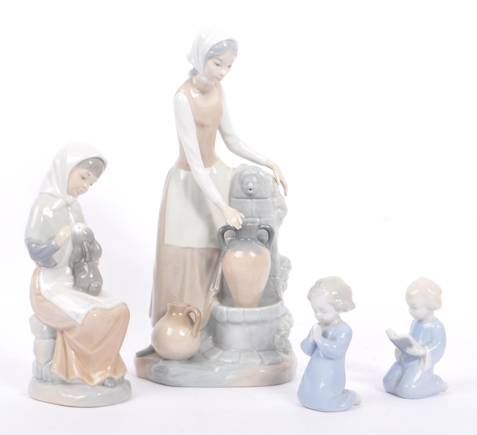 LLADRO - COLLECTION OF FOUR VINTAGE PORCELAIN FIGURINES