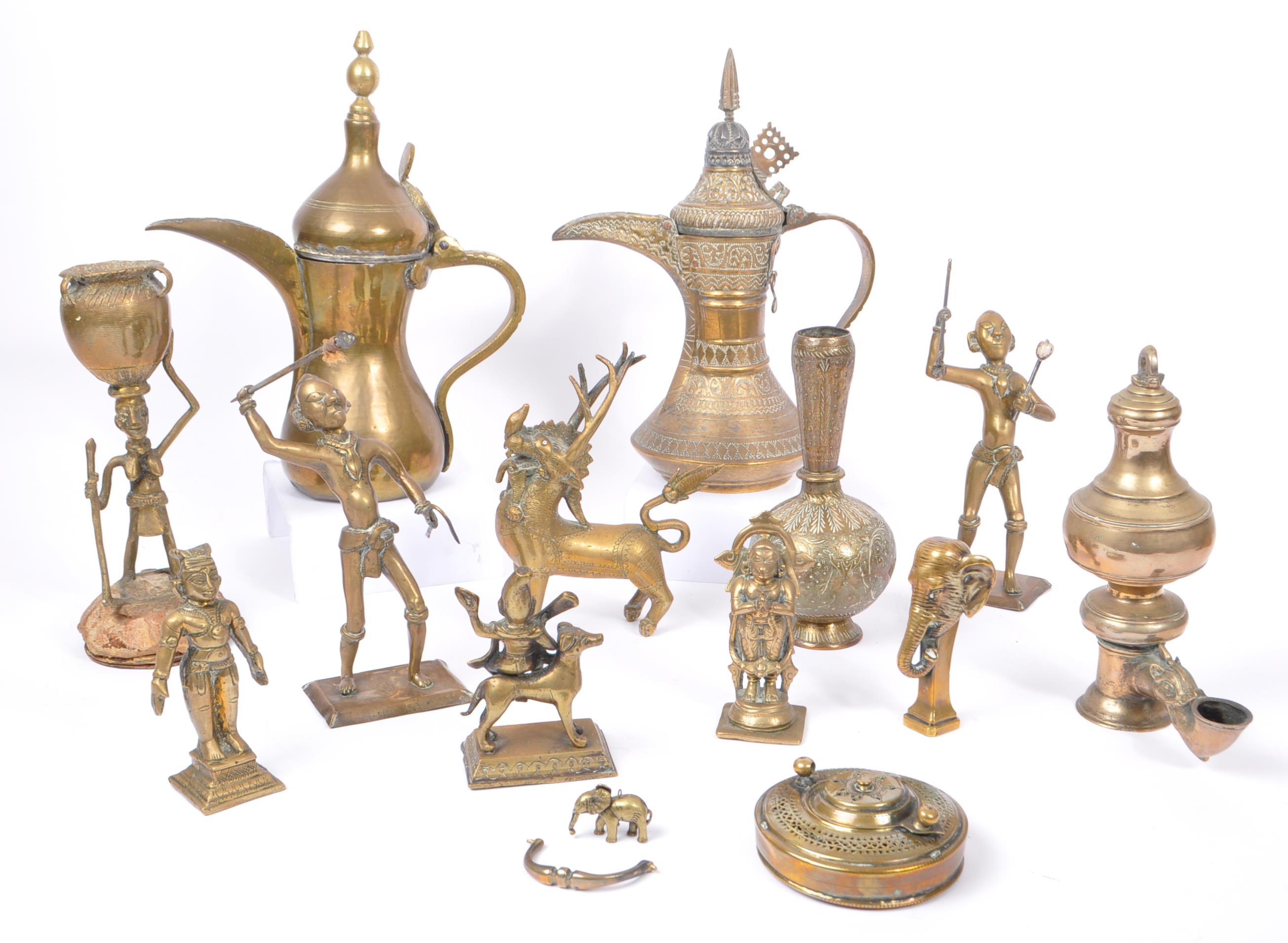 COLLECTION OF TRIBAL AND RELIGIOUS BRASS CURIOS