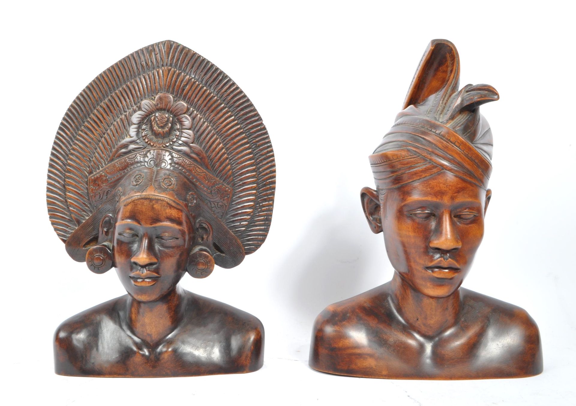 TWO MID CENTURY BALINESE HARDWOOD BUSTS