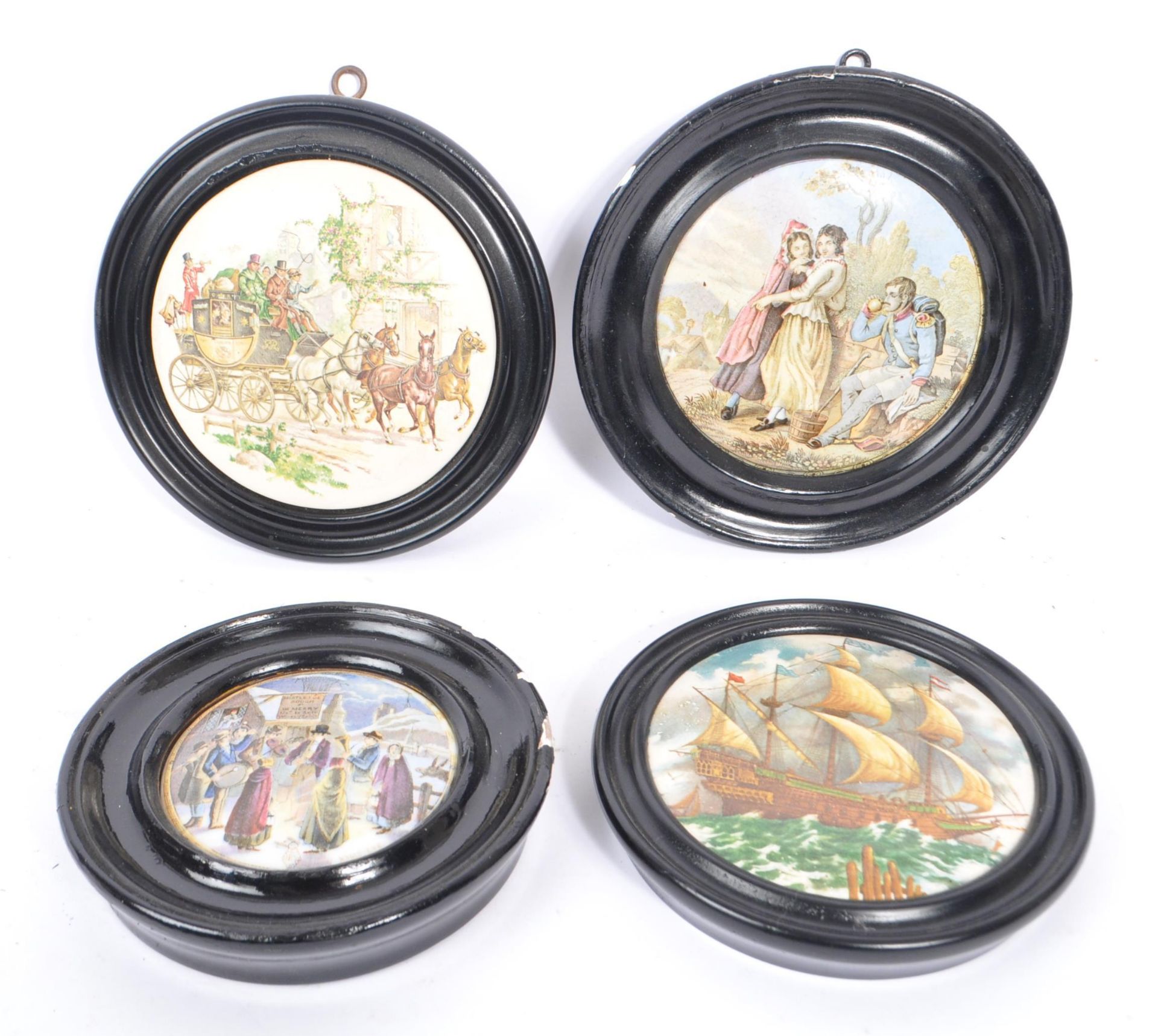 FOUR 19TH CENTURY VICTORIAN FRAMED PRATTWARE CERAMIC LIDS