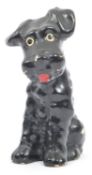 1950S CERAMIC BLACK SEATED TERRIER SCOTTIE DOG FIGURINE