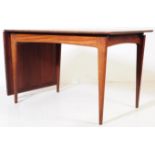 20TH CENTURY DANISH INFLUENCED TEAK DINING TABLE