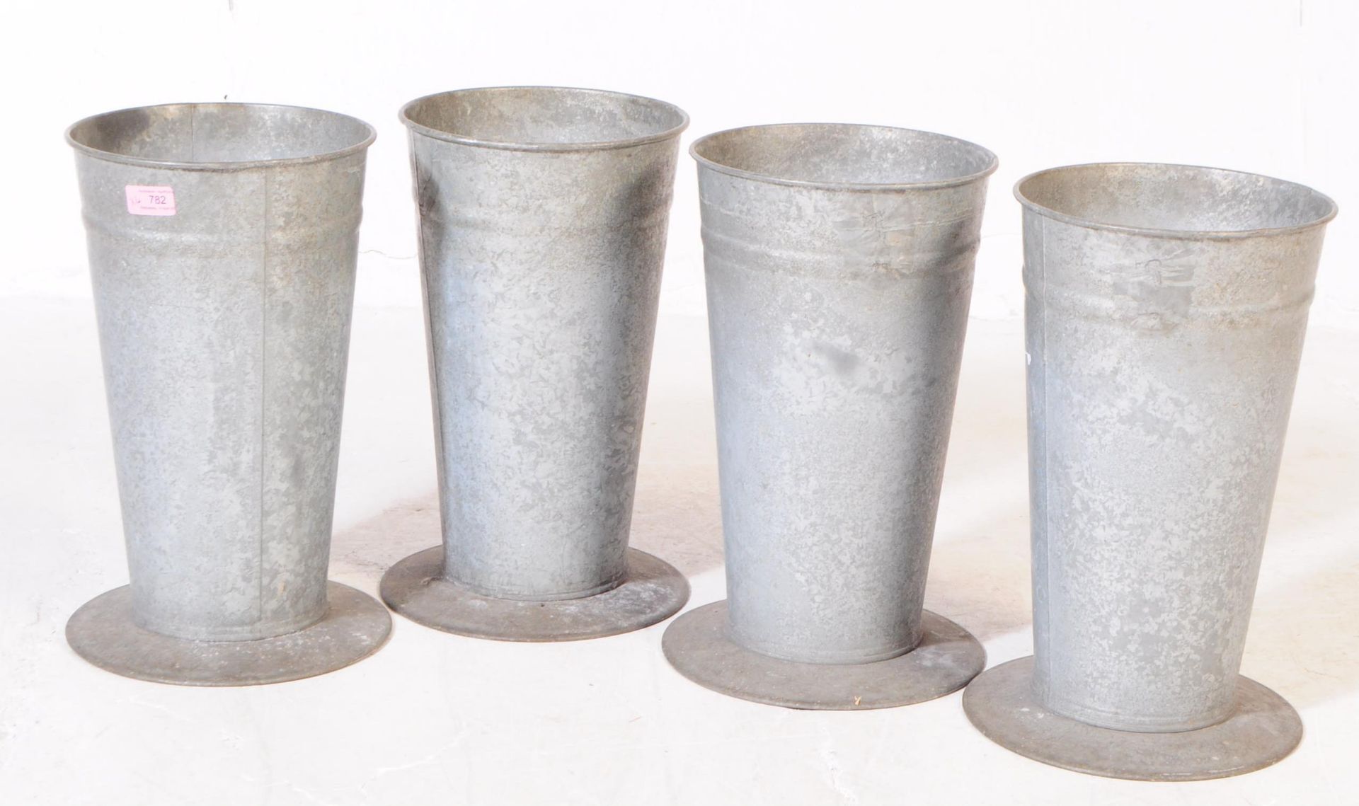 VINTAGE 20TH CENTURY SET OF FOUR GALVANISED METAL STANDS