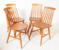 FOUR MID CENTURY STICK BACK DINING CHAIRS