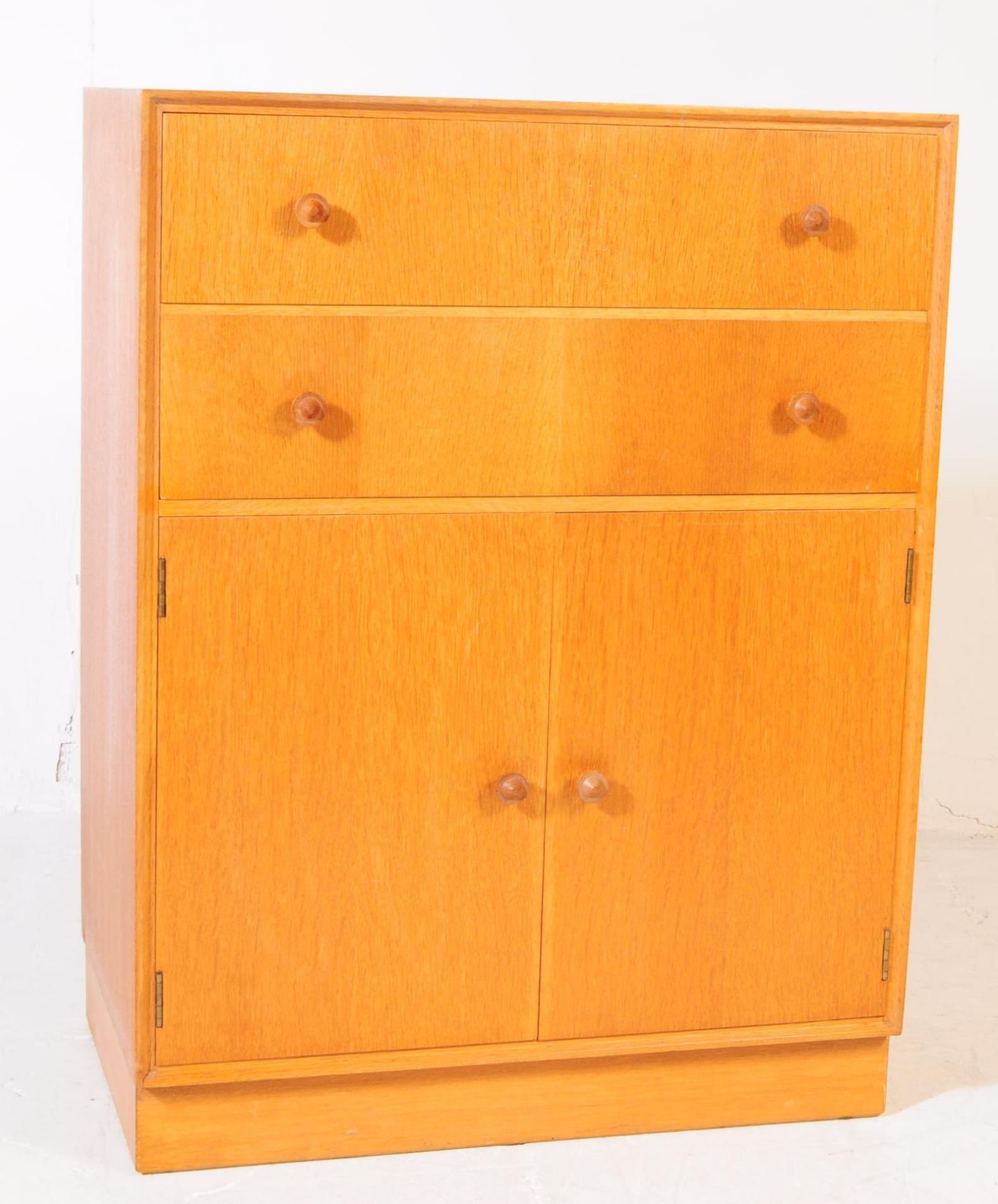 BRITISH MODERN DESIGN - LIGHT OAK TWO DRAWERS OVER CABINET