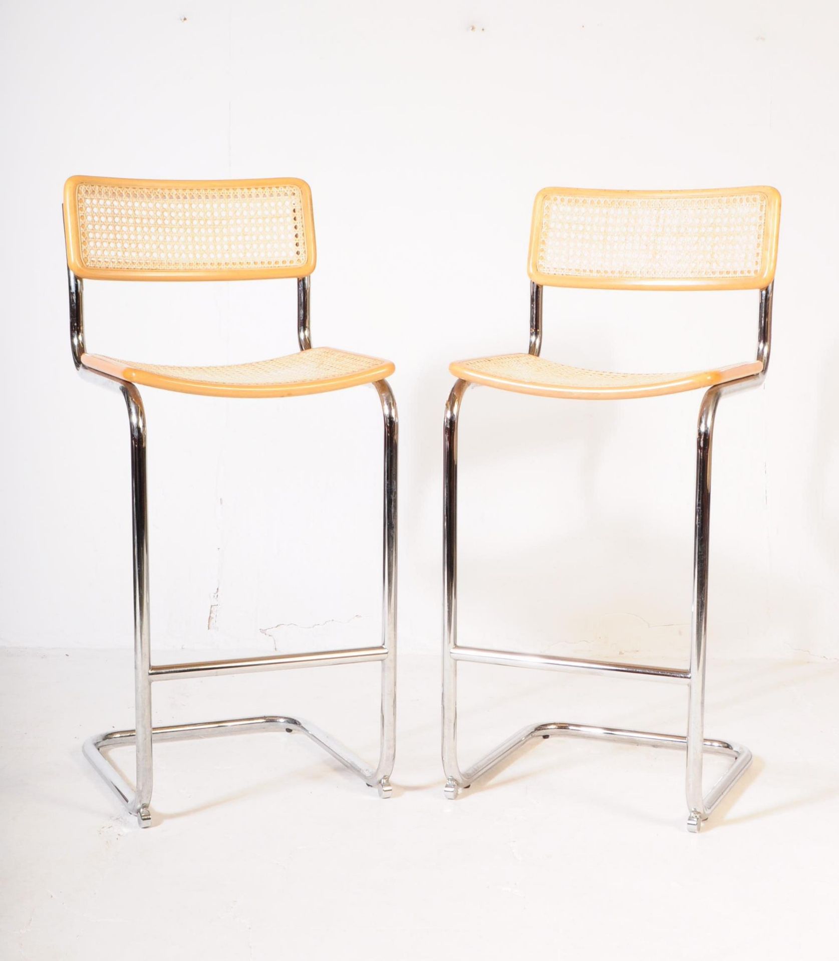 MANNER OF HABITAT - PAIR OF CHROME & RATTAN BAR STOOLS