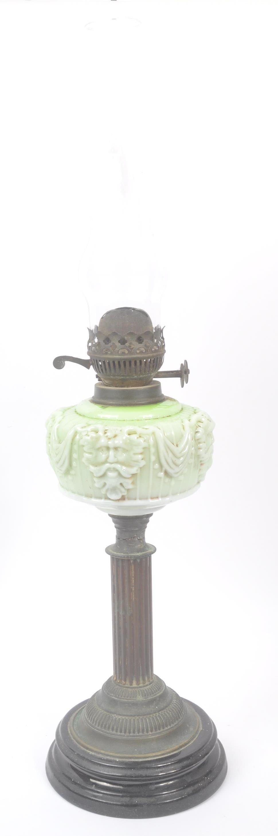 VICTORIAN BRASS OIL LAMP WITH GREEN GLASS RESERVOIR