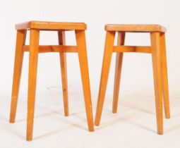 PAIR OF MID CENTURY YUGOSLAVIAN STOOLS WITH RED VINYL