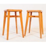 PAIR OF MID CENTURY YUGOSLAVIAN STOOLS WITH RED VINYL