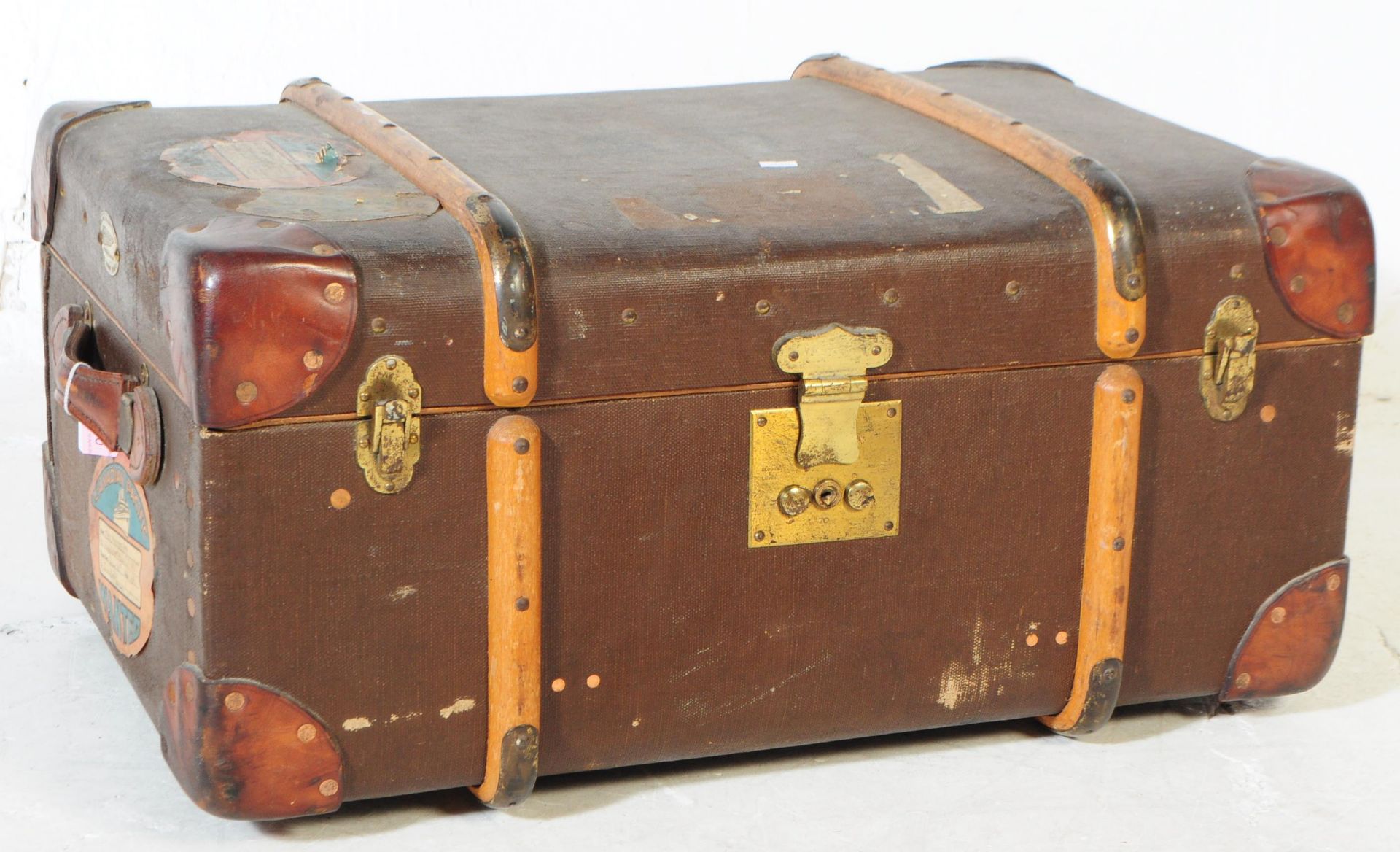 20TH CENTURY FEATHERWEIGHT STEAMER TRUNK WITH LABELS