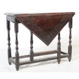 19TH CENTURY VICTORIAN CARVED OAK TOP DROP LEAF TABLE