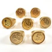 SIX GOLD TONE METAL FAUX SOVEREIGN RINGS