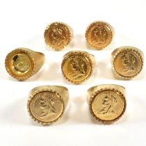 SIX GOLD TONE METAL FAUX SOVEREIGN RINGS
