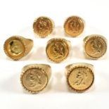 SIX GOLD TONE METAL FAUX SOVEREIGN RINGS