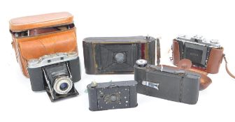 COLLECTION OF 20TH CENTURY FOLDING CAMERAS
