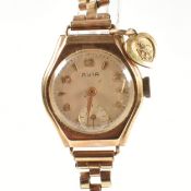 1960S 9CT GOLD CASED WATCH ON ROLLED GOLD STRAP