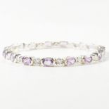 A 925 SILVER AMETHYST & CZ LINE BRACELET