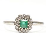 1920S 18CT WHITE GOLD EMERALD & DIAMOND CLUSTER RING