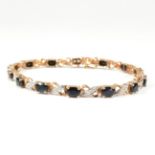 9CT GOLD, SAPPHIRE & DIAMOND LINE BRACELET