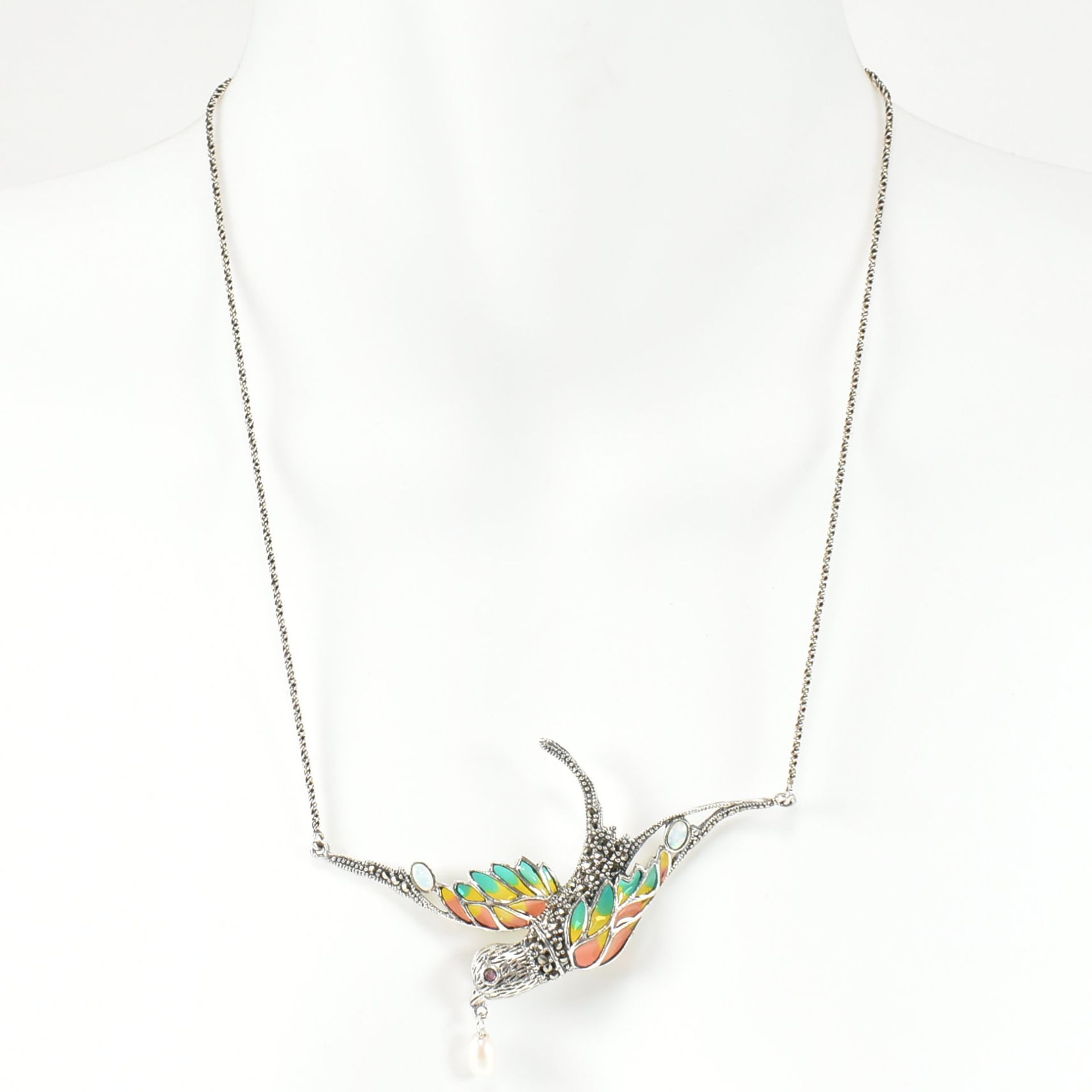 A SILVER & RUBY PLIQUE-A-JOUR BIRD IN FLIGHT NECKLACE - Bild 4 aus 4