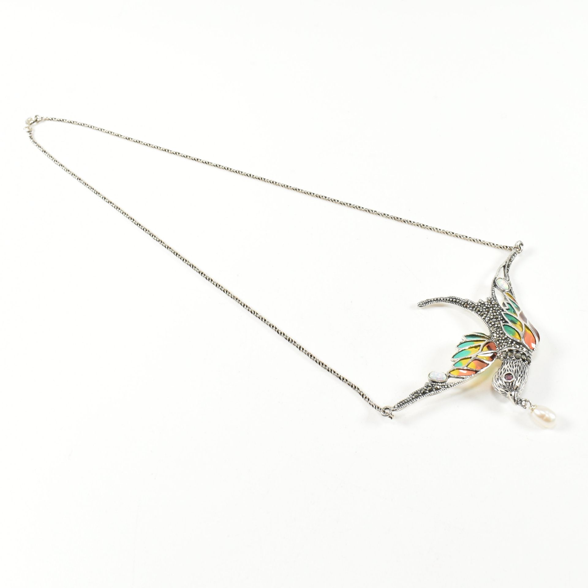 A SILVER & RUBY PLIQUE-A-JOUR BIRD IN FLIGHT NECKLACE - Image 3 of 4