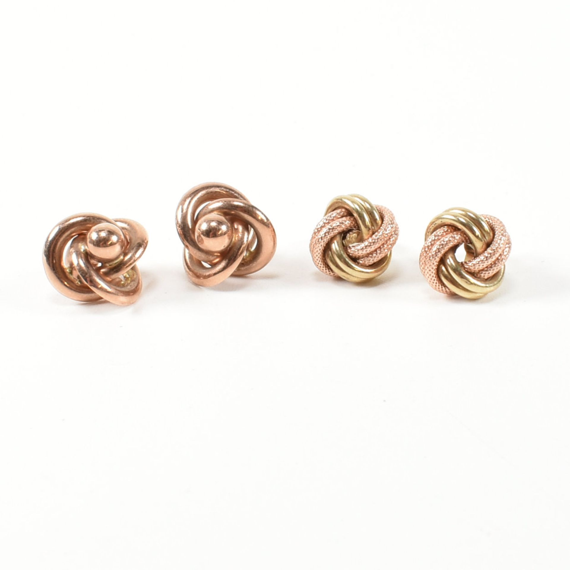 TWO 9CT GOLD KNOT STUD EARRINGS