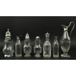 SEVEN 19TH CENTURY SILVER MOUNTED GLASS CRUET BOTTLES