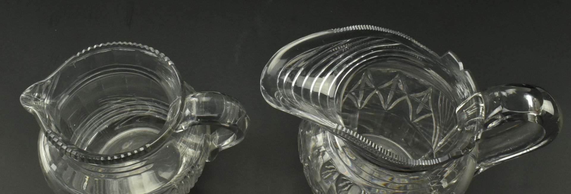 FOUR EARLY 19TH CENTURY GLASS JUGS WITH STEP CUT DESIGN - Image 8 of 11