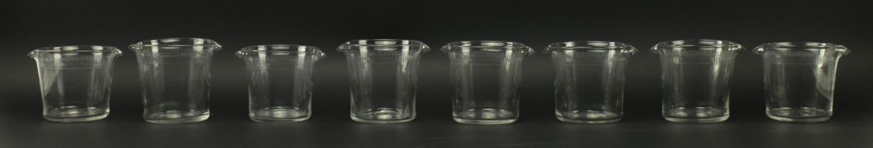 EIGHT EARLY 19TH CENTURY GLASS LIP RINSERS WITH TULIP DESIGN