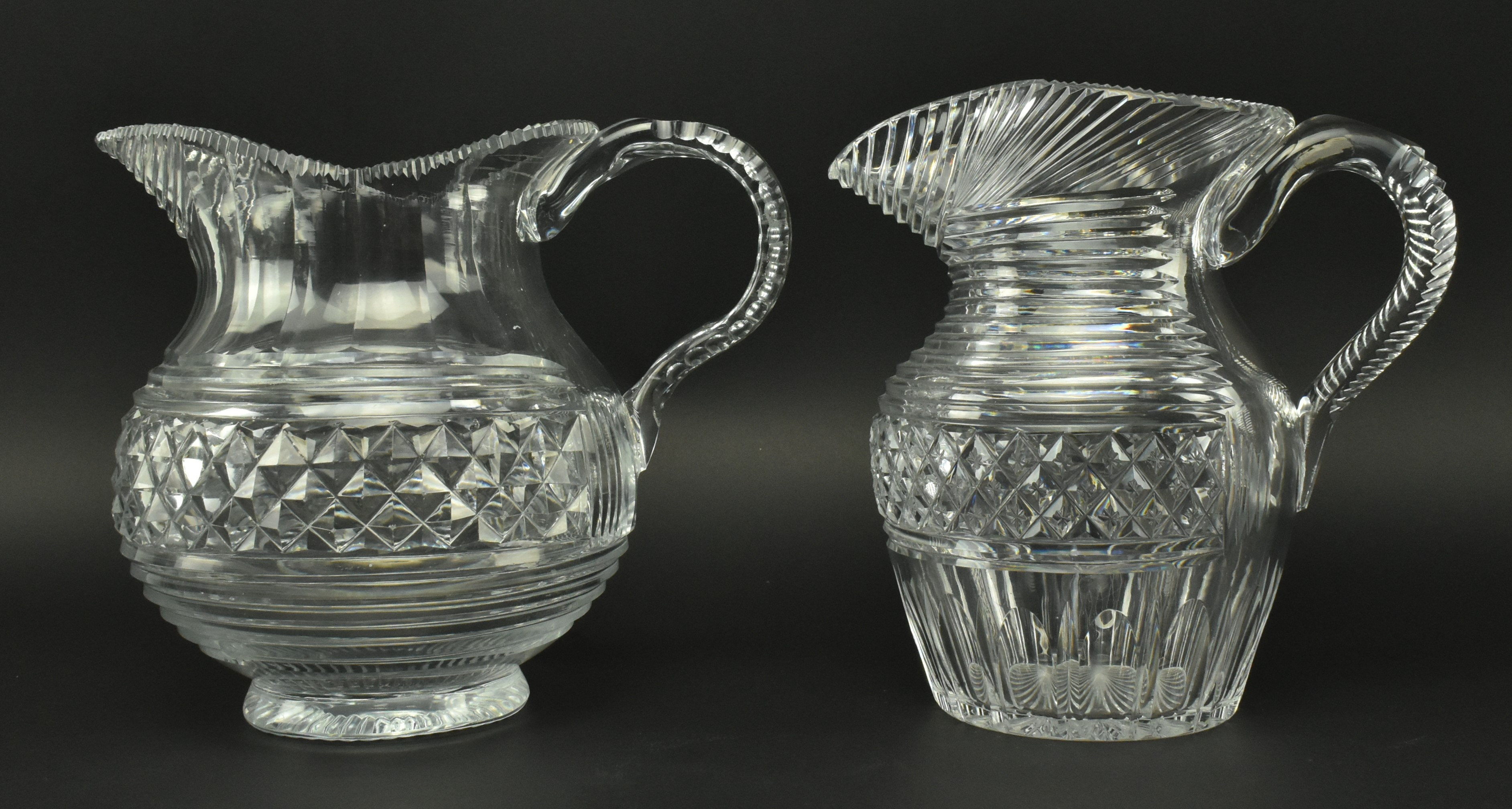 FOUR EARLY 19TH CENTURY GLASS JUGS WITH STEP CUT DESIGN - Image 2 of 11
