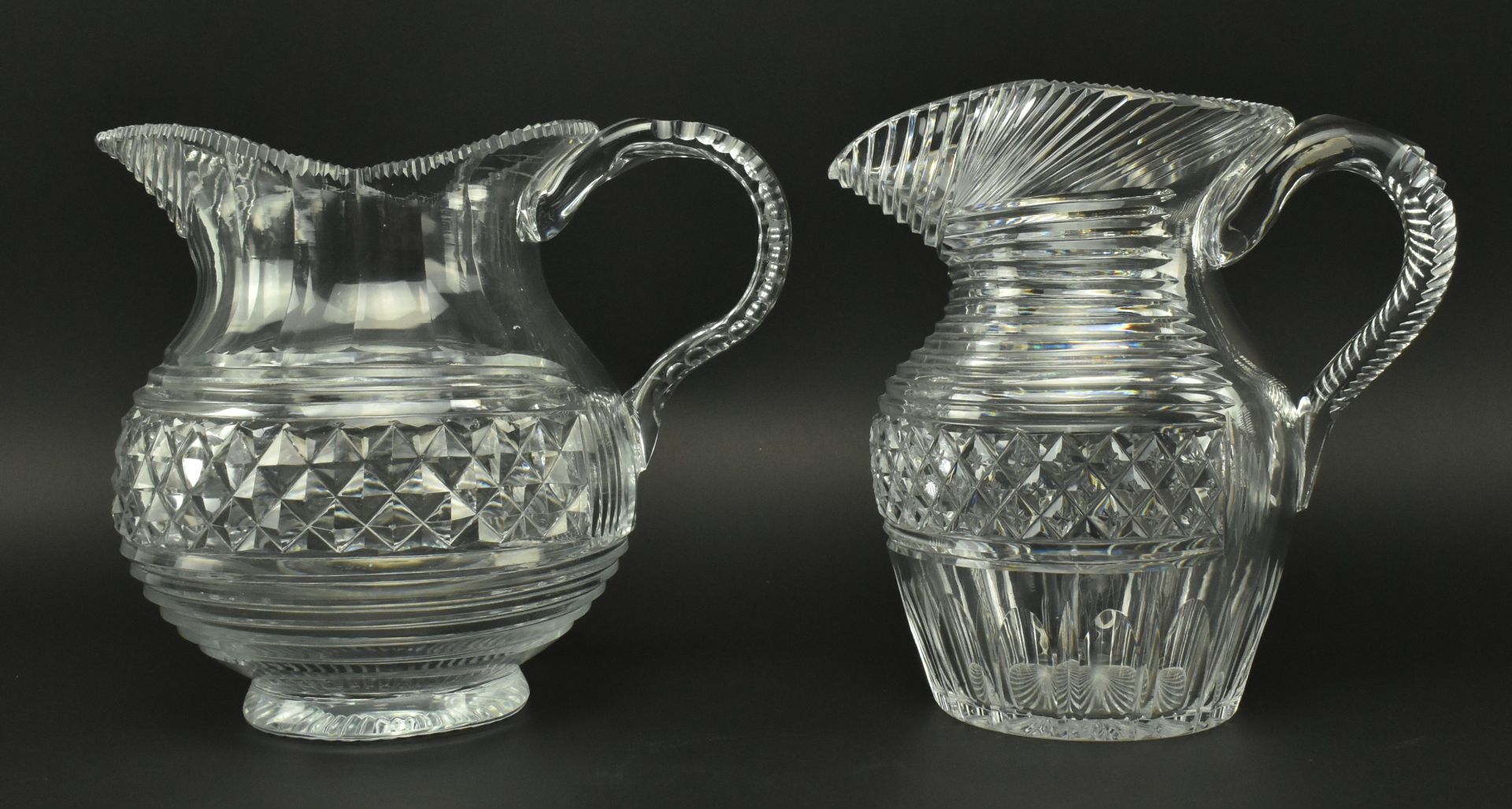 FOUR EARLY 19TH CENTURY GLASS JUGS WITH STEP CUT DESIGN - Image 2 of 11