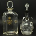 TWO LATE VICTORIAN GLASS DECANTERS, ONE WITH ROYAL CROWN