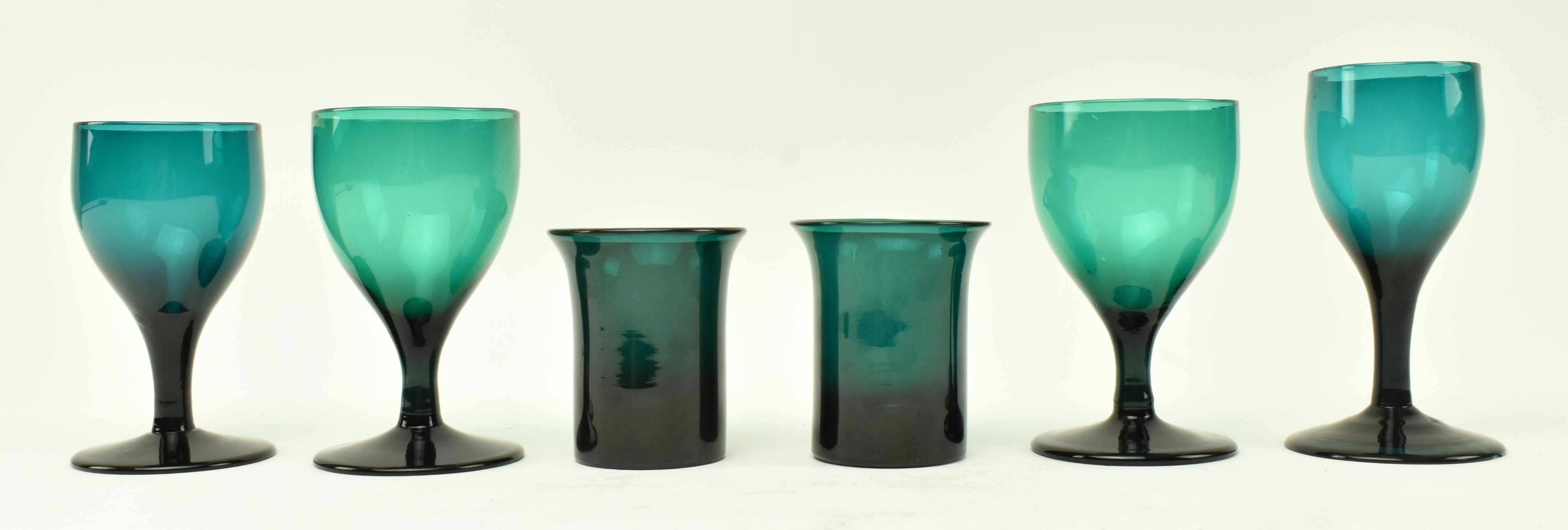 FOUR EARLY 19TH CENTURY GREEN WINE GLASSES & TWO BEAKERS