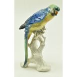 KARL ENS - MID CENTURY PORCELAIN FIGURINE OF A BLUE MACAW
