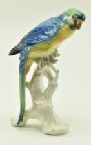 KARL ENS - MID CENTURY PORCELAIN FIGURINE OF A BLUE MACAW