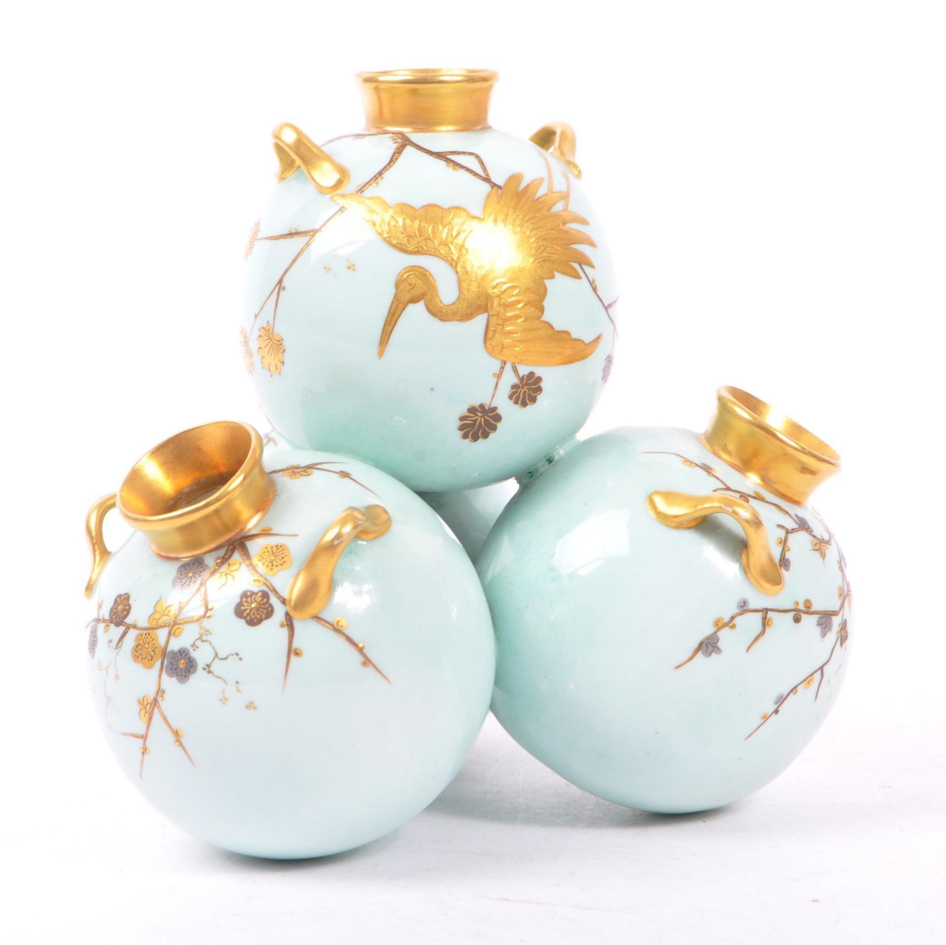 ROYAL WORCESTER - QUADRUPLE ORB VASE WITH GILT DECORATION