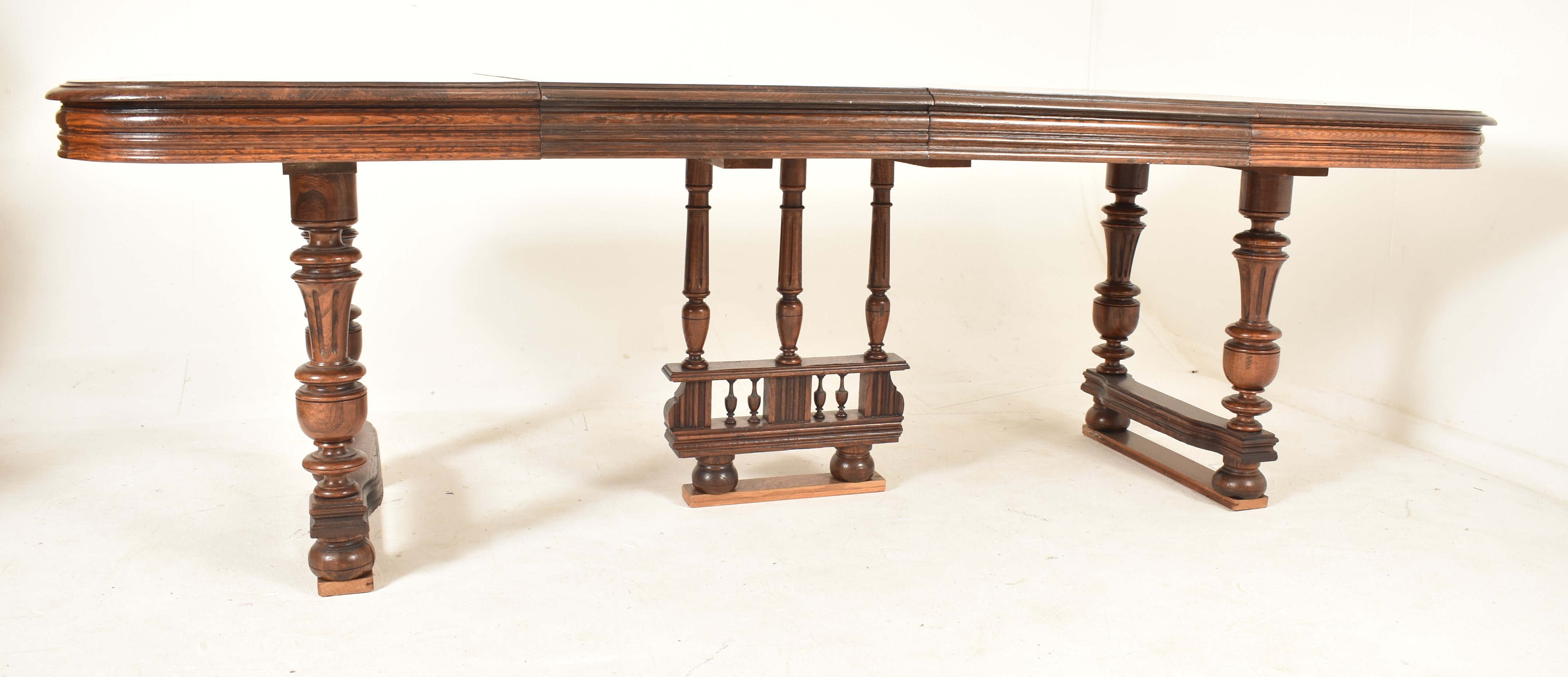 LATE 19TH CENTURY FRENCH OAK DRAW-LEAF DINING TABLE - Image 2 of 5