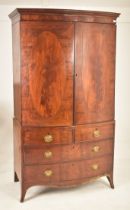 19TH CENTURY FLAME MAHOGANY BOW FRONTED LINEN PRESS