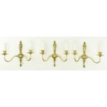 THREE ITALIAN STYLE GILDED METAL TWIN ARM WALL SCONCES