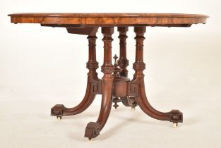 19TH CENTURY HIGH VICTORIAN WALNUT OVAL TILT TOP TABLE