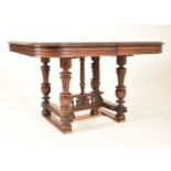 LATE 19TH CENTURY FRENCH OAK DRAW-LEAF DINING TABLE