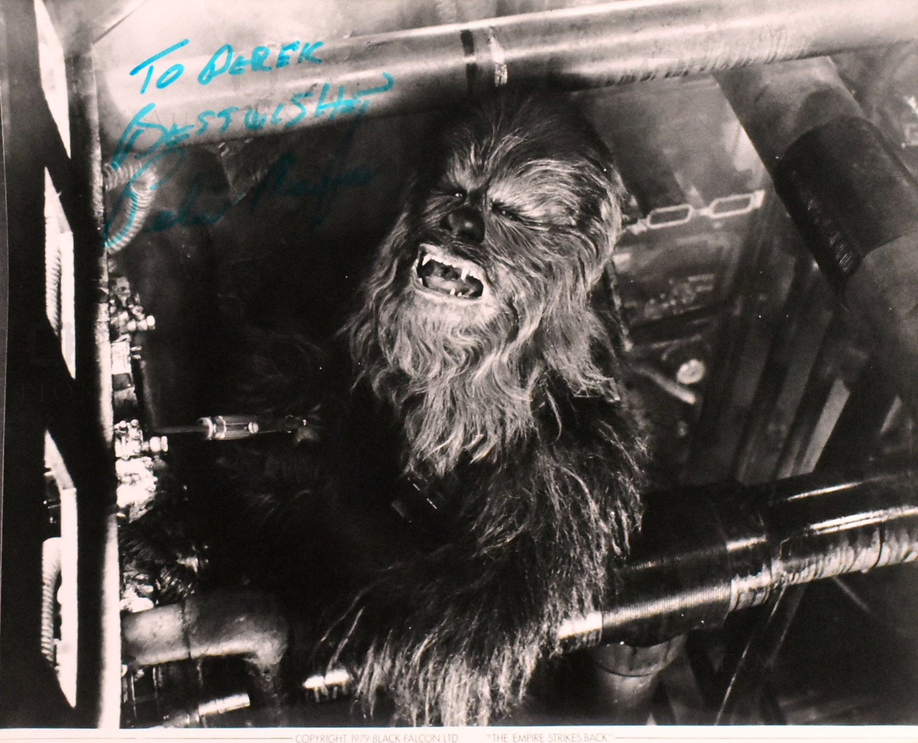 STAR WARS - PETER MAYHEW (D.2019) - SIGNED PHOTOGRAPH TO ASST. DIRECTOR