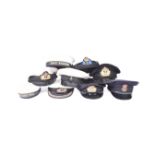 COLLECTION OF ASSORTED ROYAL NAVY PEAKED HAT VISORS