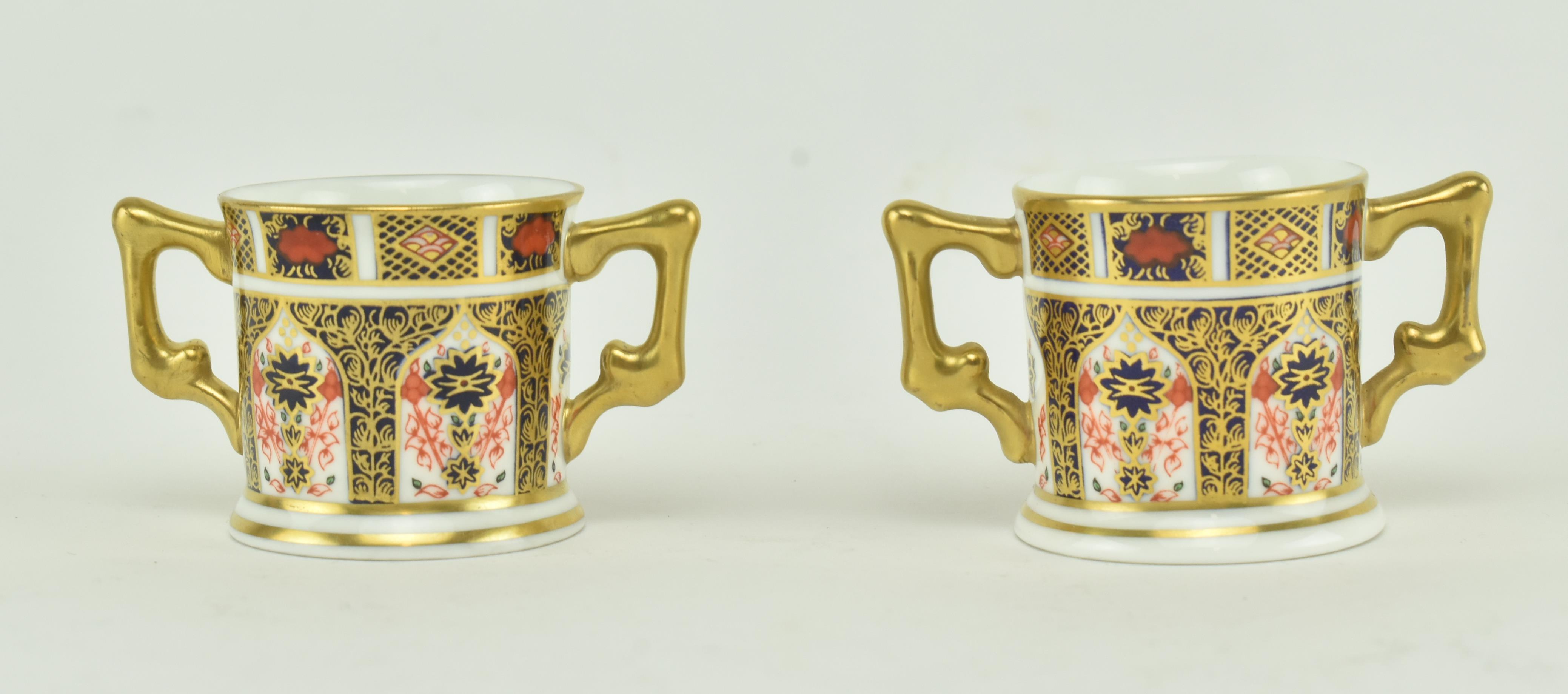 A COLLECTION OF ROYAL CROWN DERBY MINIATURE LOVING CUPS - Image 5 of 8