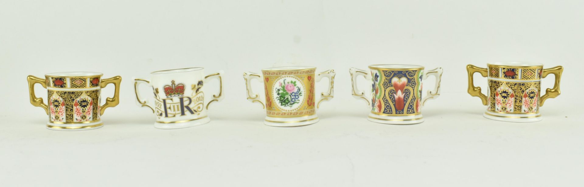 A COLLECTION OF ROYAL CROWN DERBY MINIATURE LOVING CUPS - Image 2 of 8